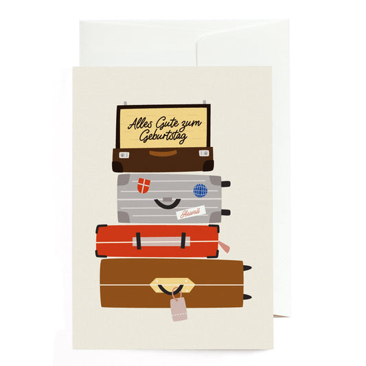 Greeting card stack of suitcases